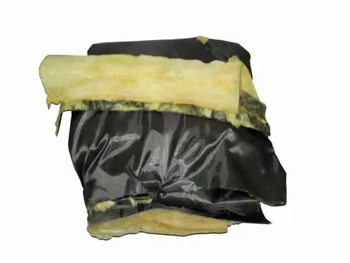 Wärmedämmung aus gelbem Material, verpackt in schwarz, für Anwendungen im Heizungsbereich. Produkt von Wolf, geeignet zur Verbesserung der Energieeffizienz.